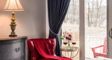 Cozy guest room at Landmark Inn during the winter