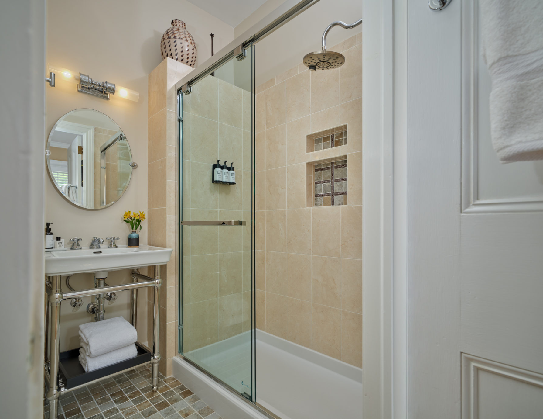 Pristine tile shower and bathroom