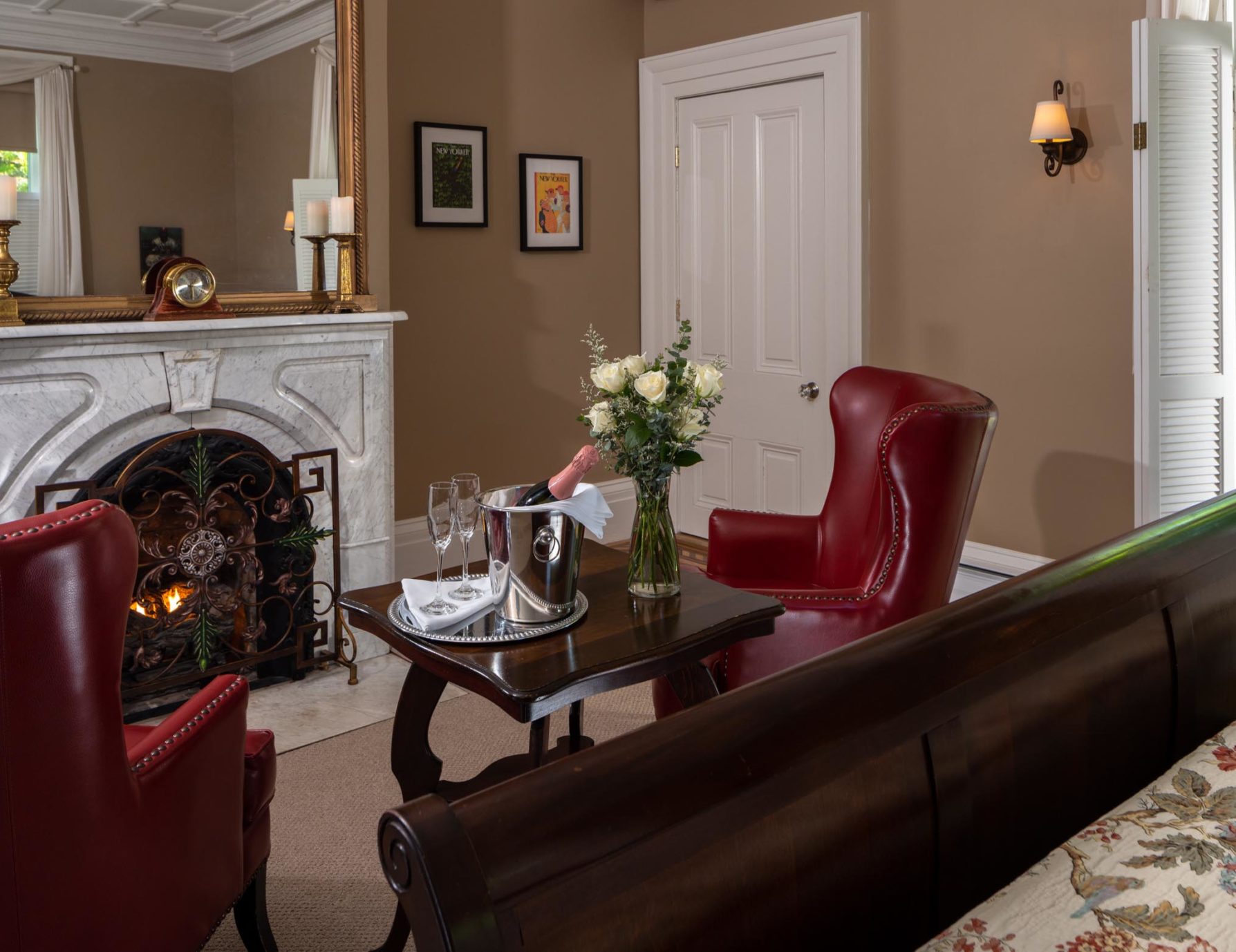 Sitting area with fireplace at a Cooperstown Hotel 