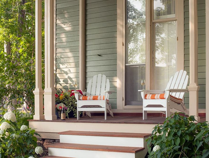 Adirondack chairs outside on the Landmark Inn porch in Cooperstown, NY