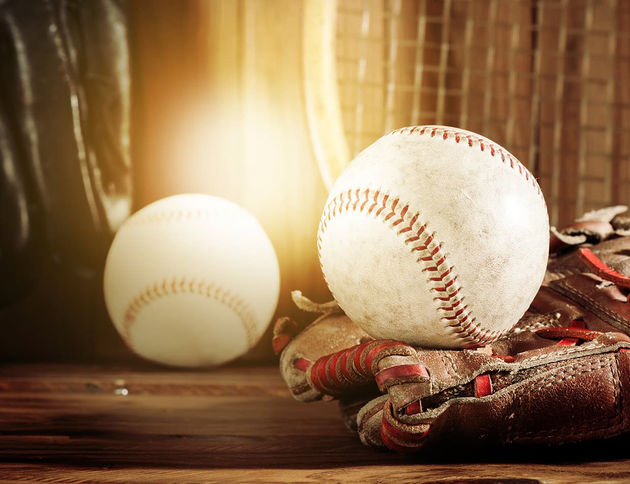 baseballs and a glove at the Baseball Hall of Fame in Cooperstown