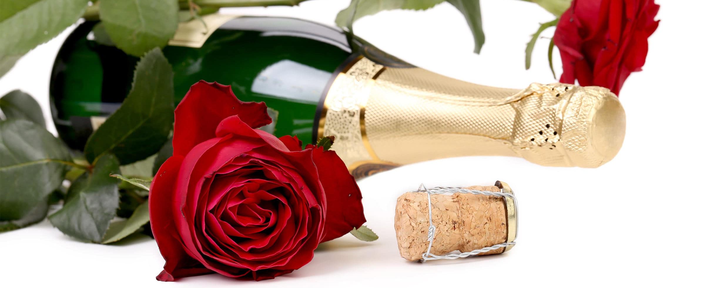 Bottle of Champagne with Red Rose