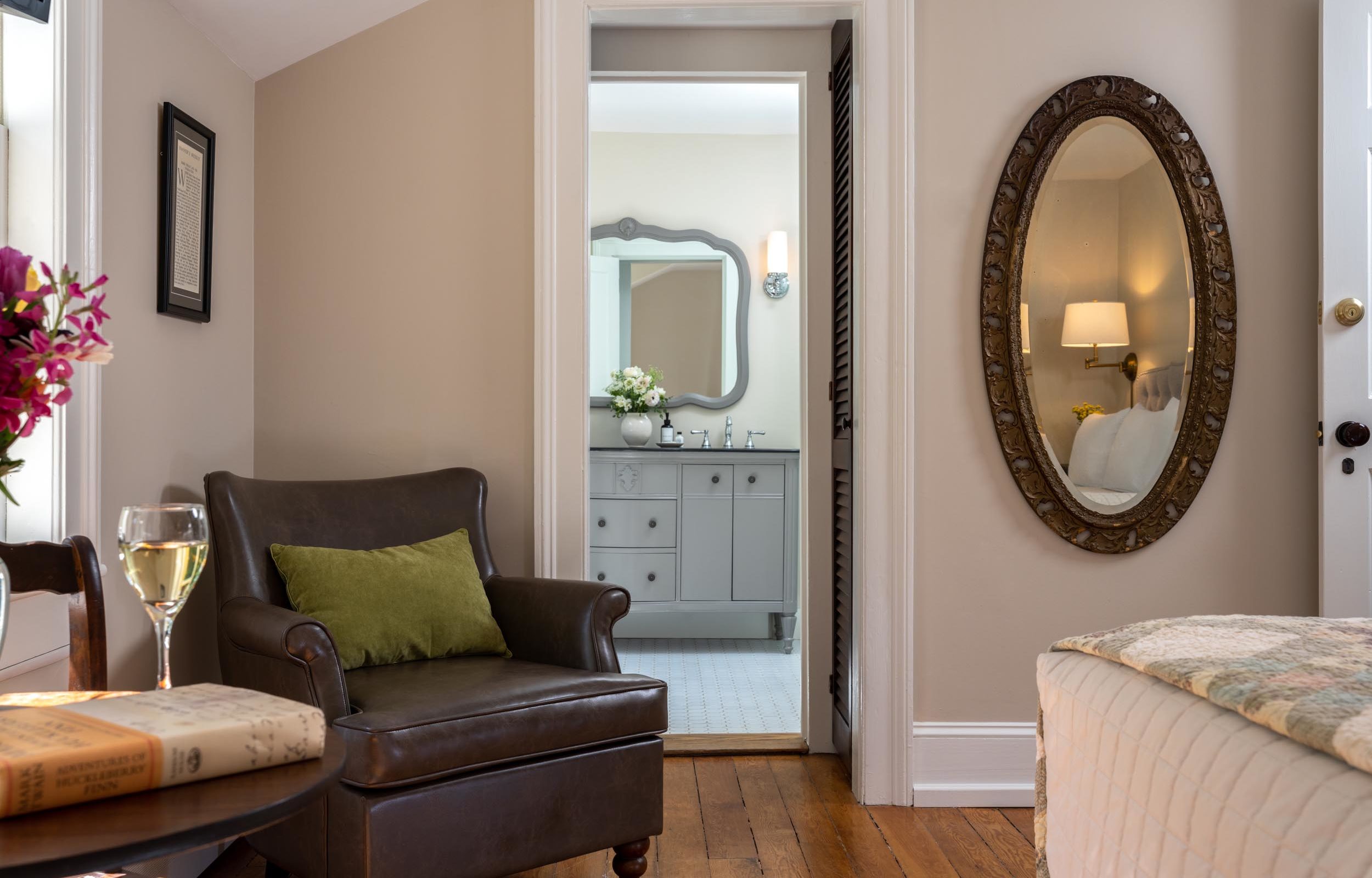 Inn in Cooperstown - View of a room with armchair and bathroom