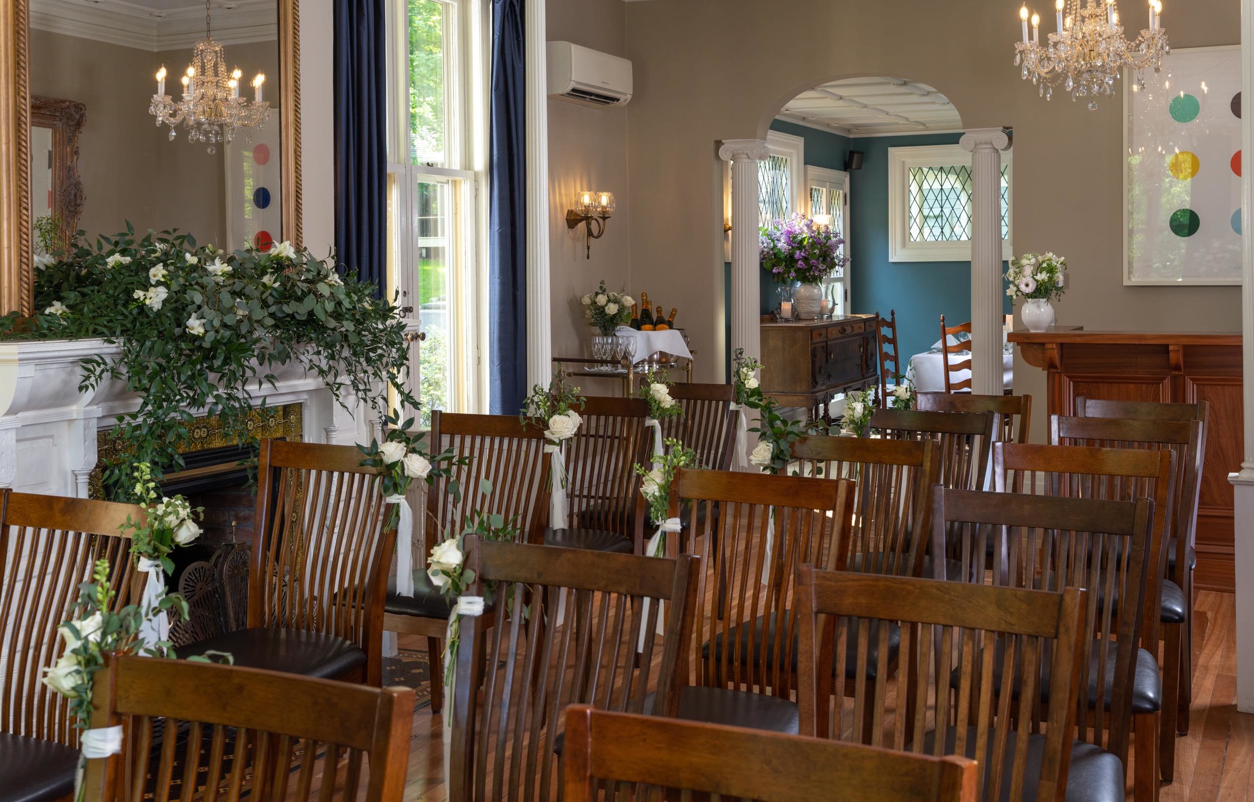 Wooden guest seats at cooperstown wedding Vvnue